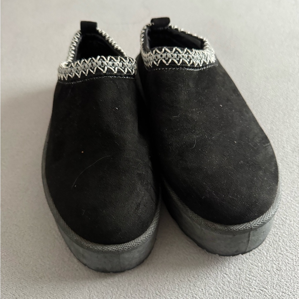 Black Slip-On Shoes with White Trim